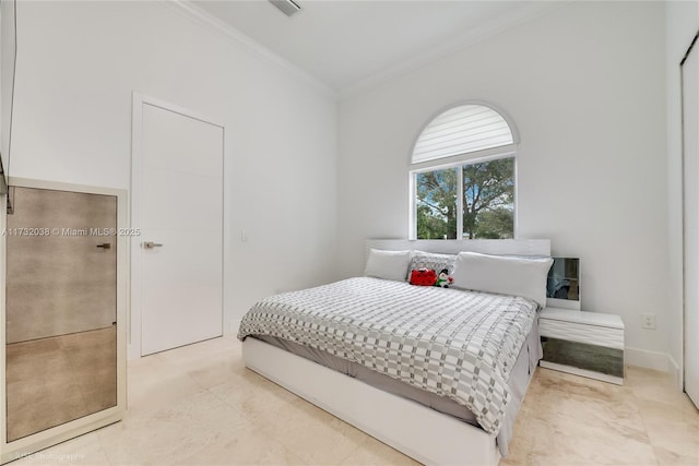 bedroom featuring ornamental molding