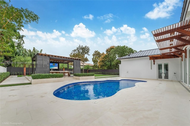 view of swimming pool featuring french doors, a pergola, and a patio