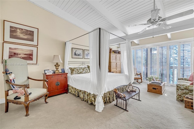 bedroom with beamed ceiling, light colored carpet, and ceiling fan