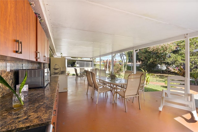 sunroom / solarium with plenty of natural light