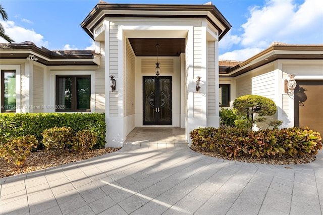 view of exterior entry with french doors