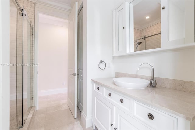 bathroom featuring vanity, tile patterned floors, and walk in shower