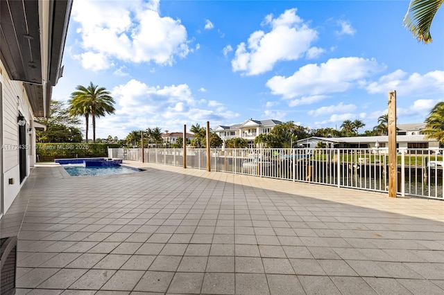 view of patio with a fenced in pool