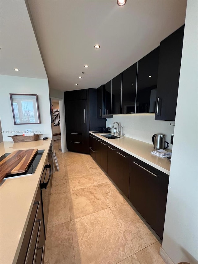 kitchen featuring cooktop and sink