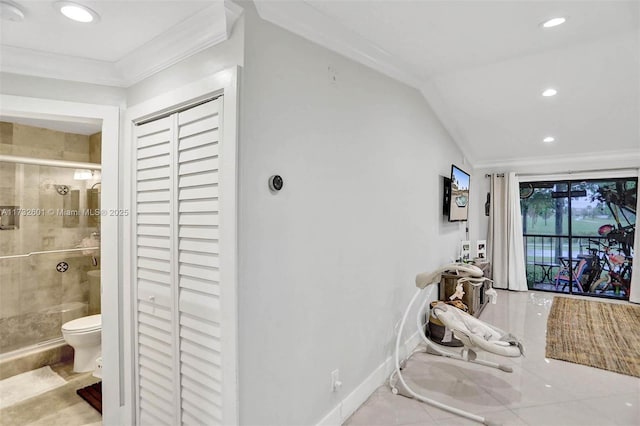 bathroom with walk in shower, tile patterned floors, crown molding, and toilet