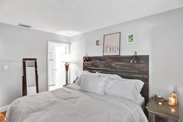 bedroom with a textured ceiling