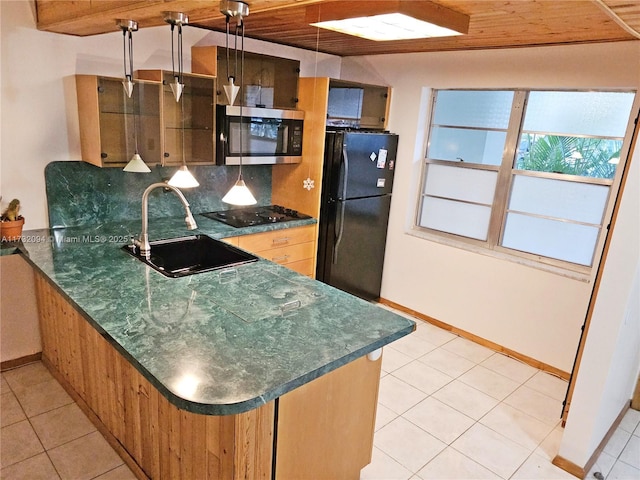 kitchen with wooden ceiling, sink, decorative backsplash, and black appliances