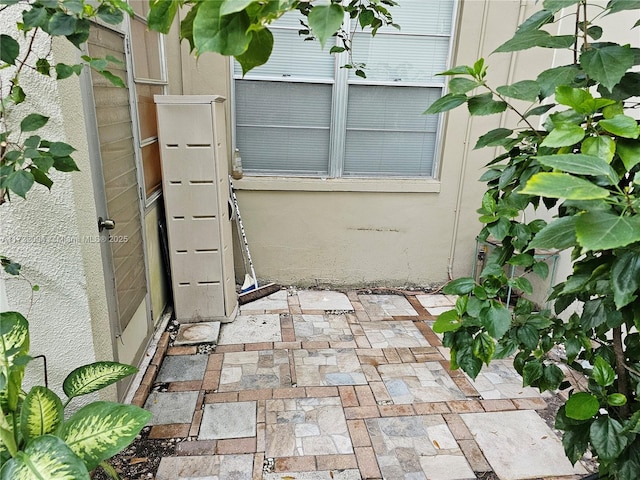 exterior space with stucco siding