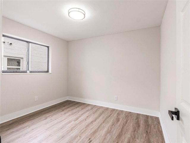 empty room featuring light hardwood / wood-style floors