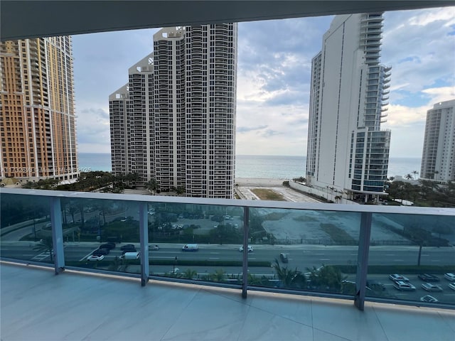 balcony with a water view and cooling unit