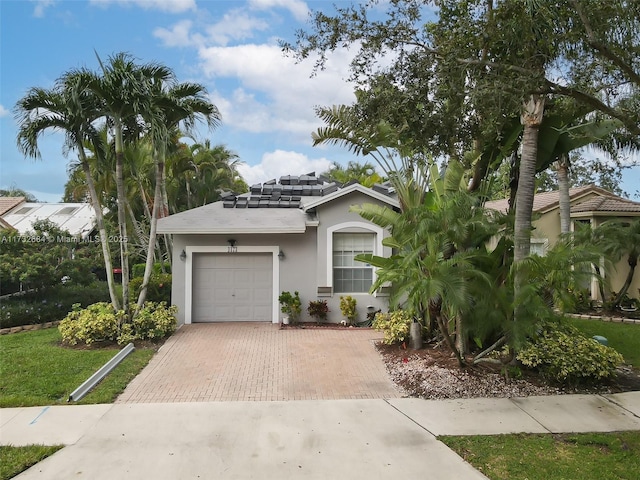 view of front of home featuring a garage