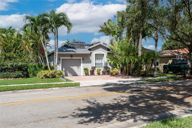 view of front of property featuring a garage