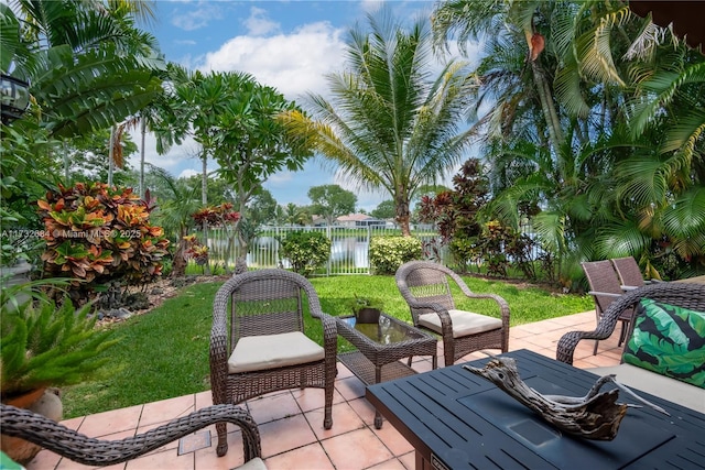 view of patio featuring a water view