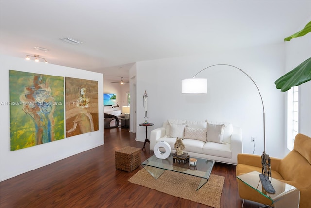 living room with dark hardwood / wood-style floors