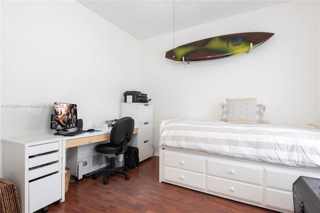 bedroom featuring dark hardwood / wood-style floors