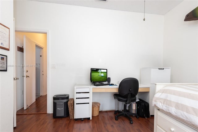 bedroom featuring dark hardwood / wood-style floors