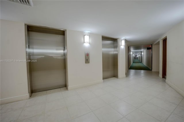 hallway featuring elevator