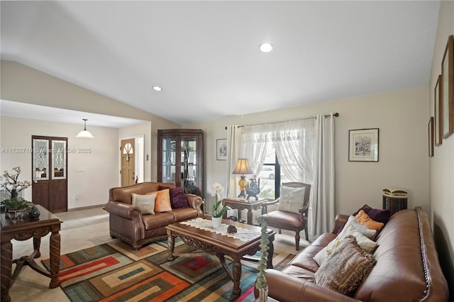 tiled living room featuring lofted ceiling