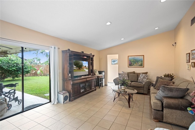 tiled living room featuring lofted ceiling