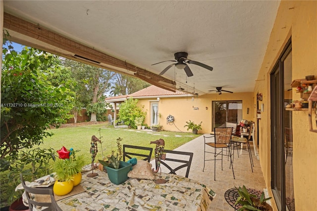 view of patio / terrace with ceiling fan