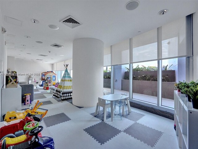 17001 Collins Ave Unit 1802, Sunny Isles Beach, FL 33160 - playroom featuring plenty of natural light