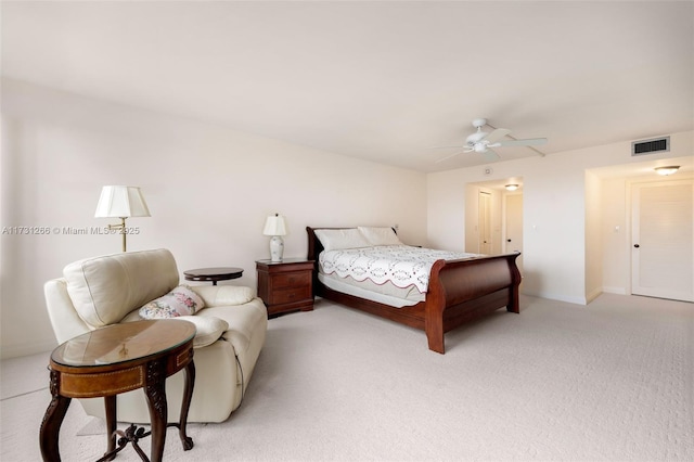 bedroom with light carpet and ceiling fan