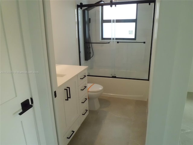 full bathroom with vanity, tile patterned flooring, shower / bath combination with glass door, and toilet