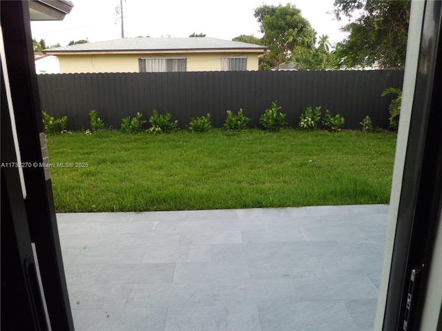 view of yard with a patio area