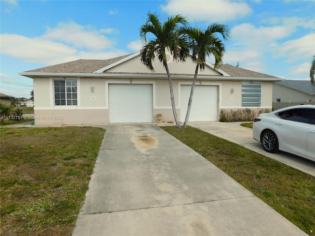 ranch-style house with a garage and a front lawn