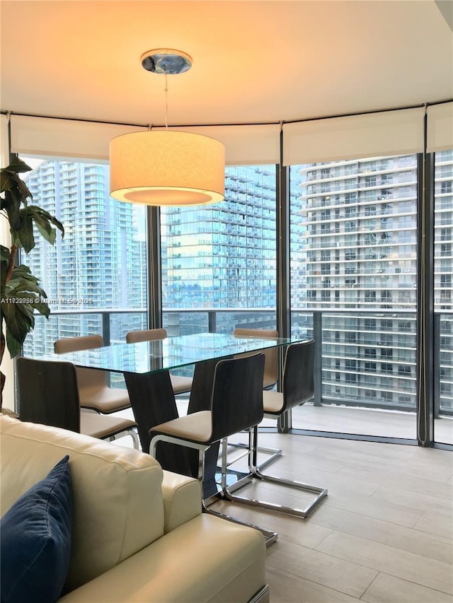 dining room featuring floor to ceiling windows