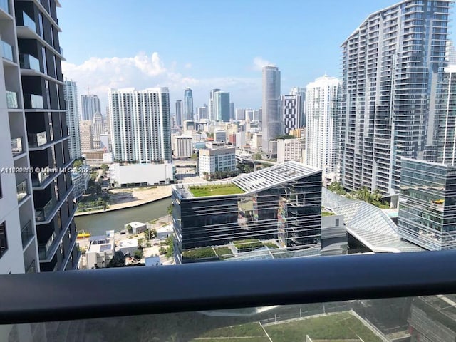 property's view of city with a water view