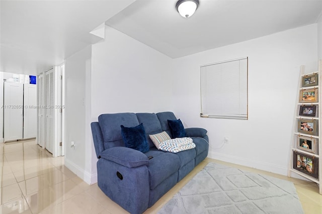 living room featuring tile patterned floors