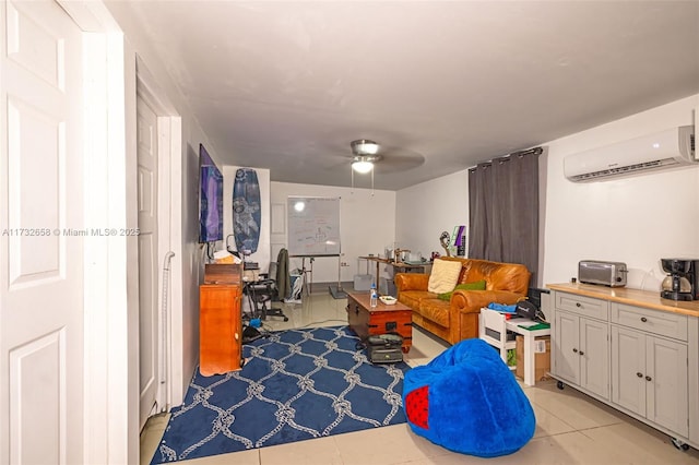 interior space with light tile patterned floors, a wall unit AC, and ceiling fan