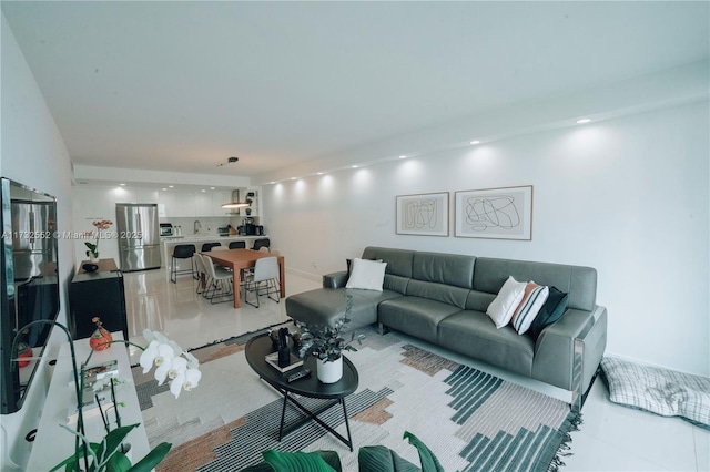 living room featuring light tile patterned flooring