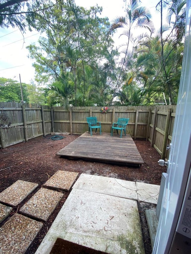 exterior space featuring a wooden deck