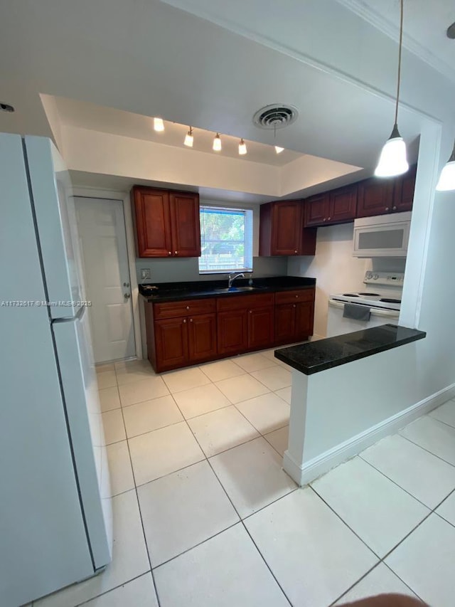 kitchen featuring pendant lighting, sink, ornamental molding, light tile patterned floors, and white appliances