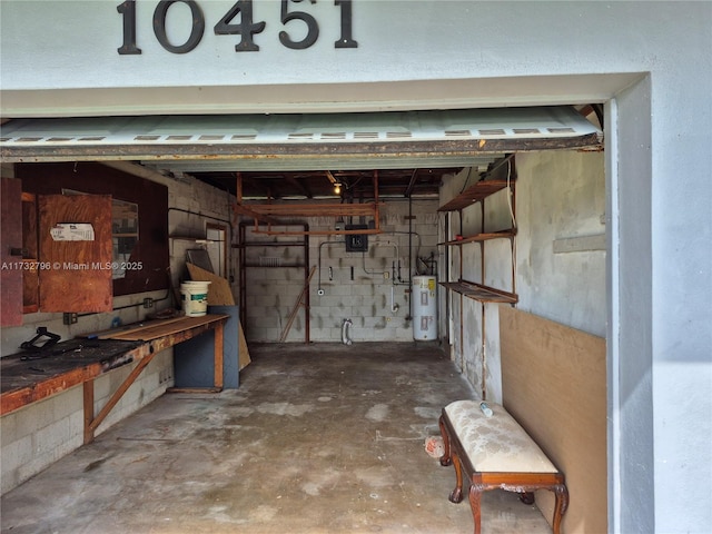 garage featuring electric water heater