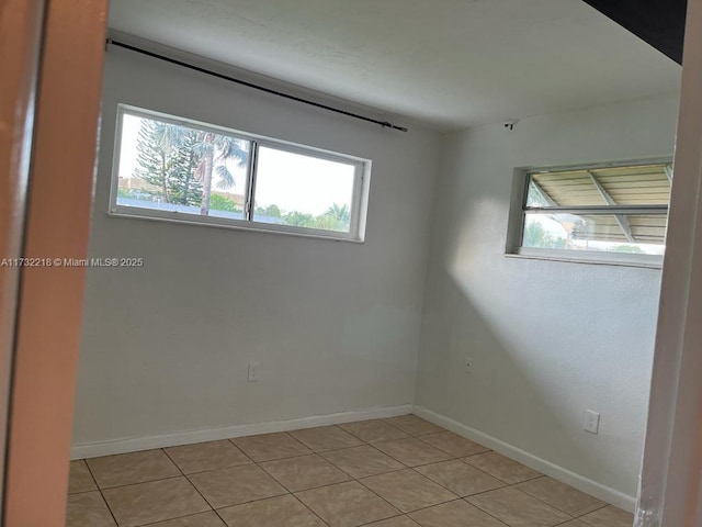 view of tiled spare room