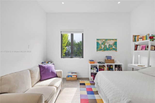 bedroom with light wood-type flooring