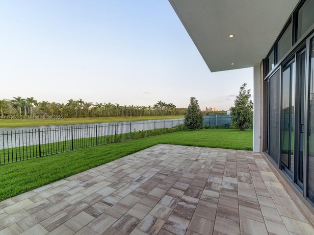 view of patio / terrace featuring a water view