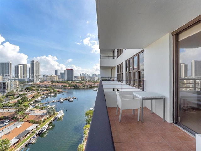 balcony featuring a water view