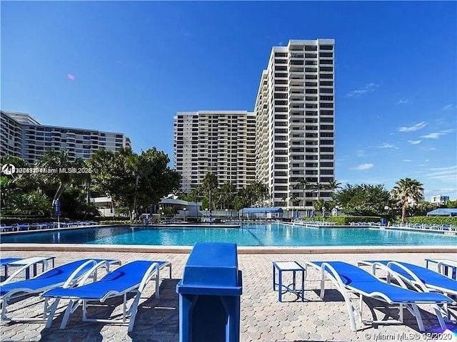 view of swimming pool featuring a patio