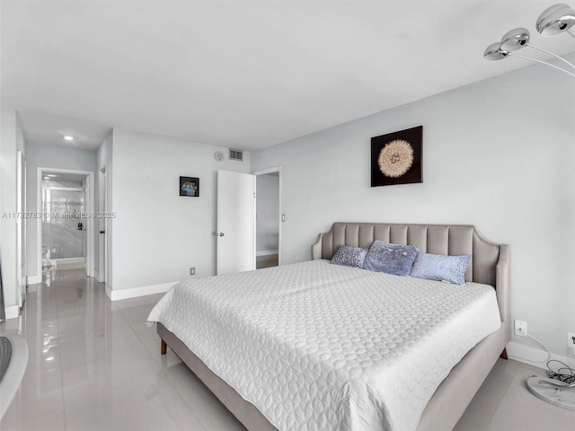 bedroom with light tile patterned flooring