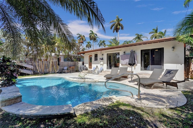 view of swimming pool with a patio area