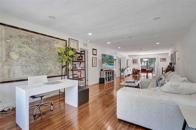 living room featuring wood-type flooring