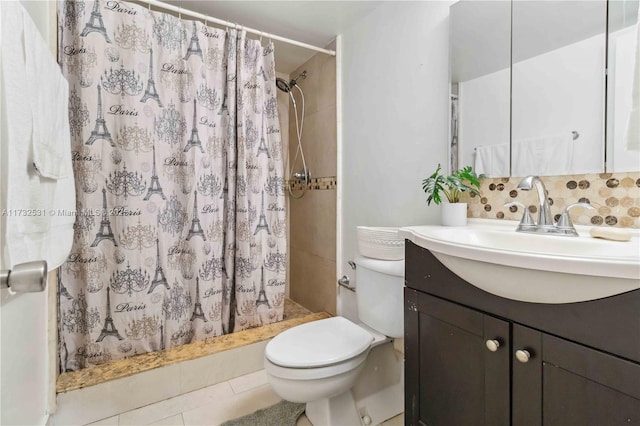 bathroom with vanity, decorative backsplash, curtained shower, tile patterned floors, and toilet