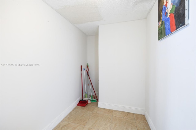 interior space featuring a textured ceiling