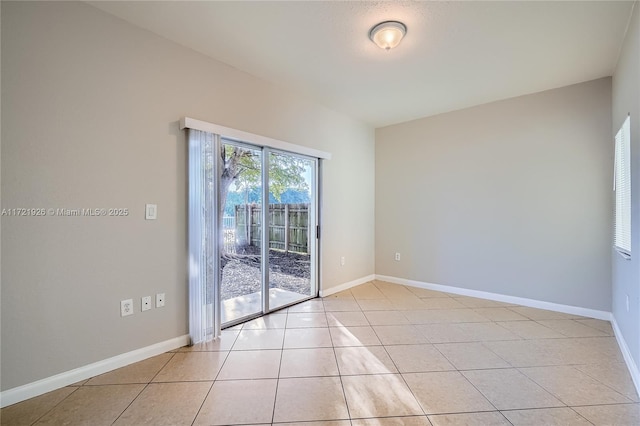 view of tiled spare room