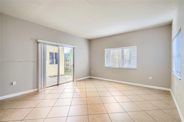 view of tiled spare room