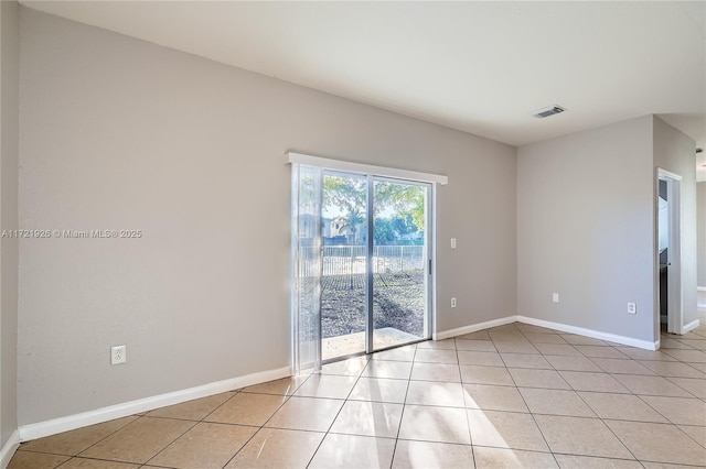 view of tiled spare room